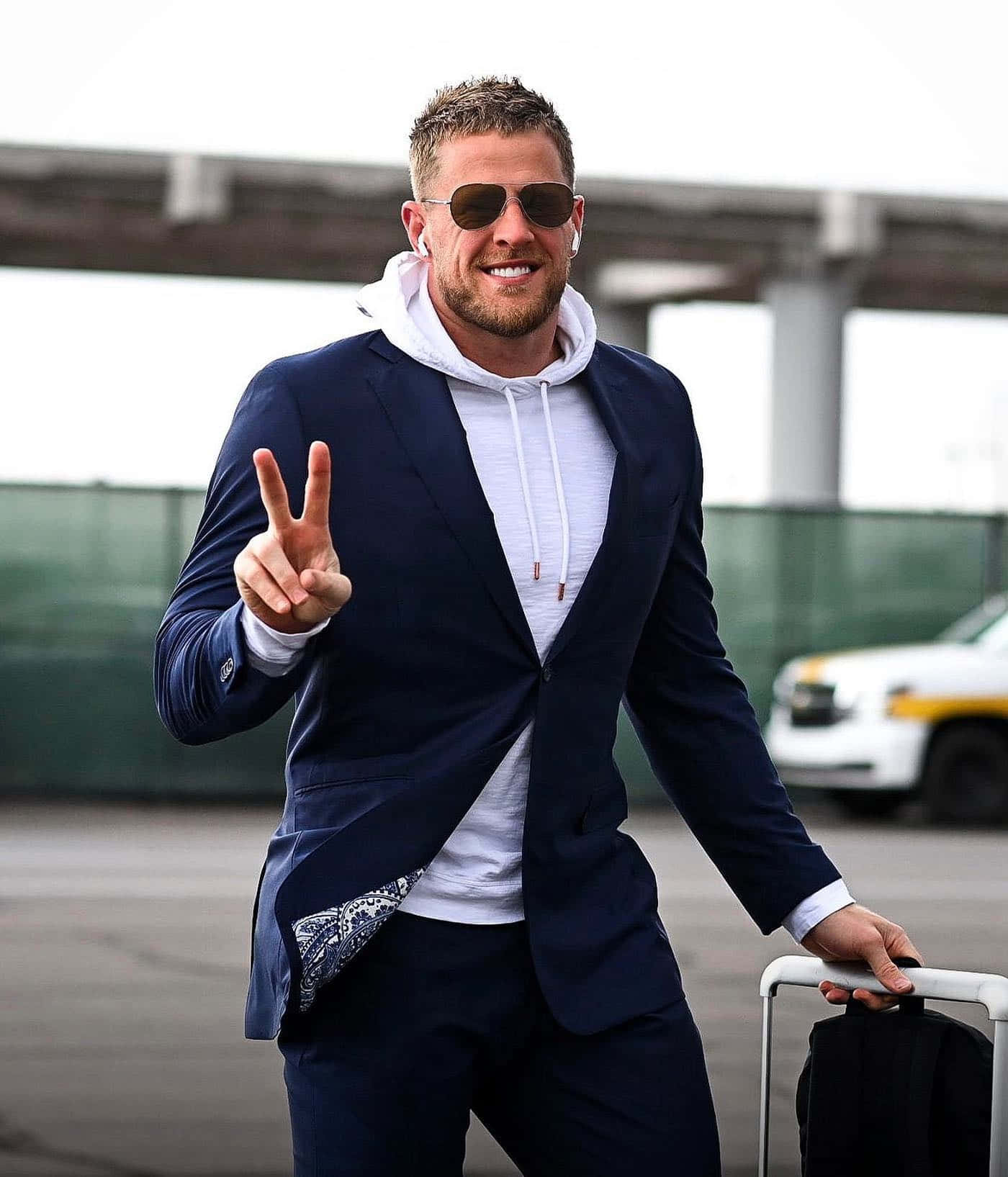 1. J.j. Watt Showing Off His Impressive Physique Wallpaper