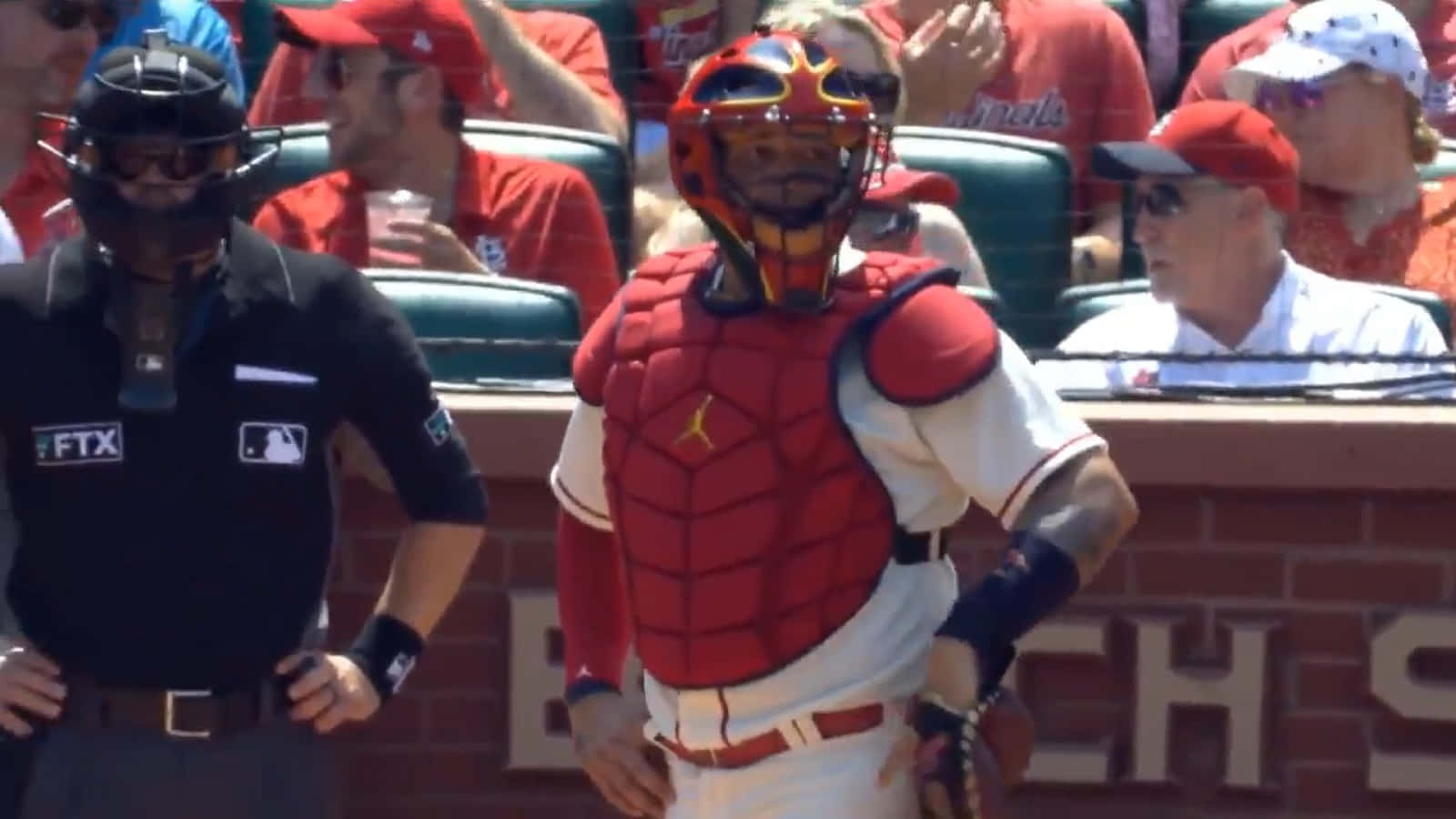 A Baseball Player Is Standing In Front Of A Catcher Wallpaper