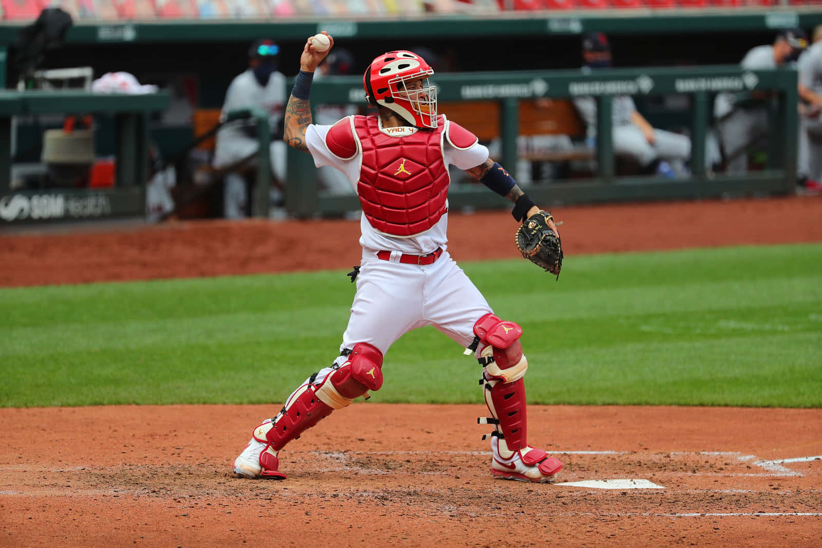 A Baseball Player Is Throwing A Ball Wallpaper