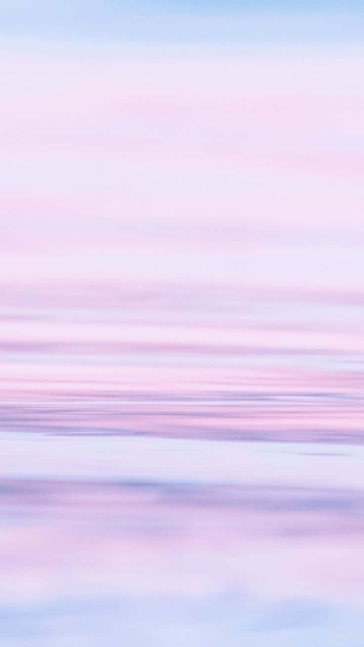 A Beautiful Landscape Of Pastel Blue And Pink Wallpaper