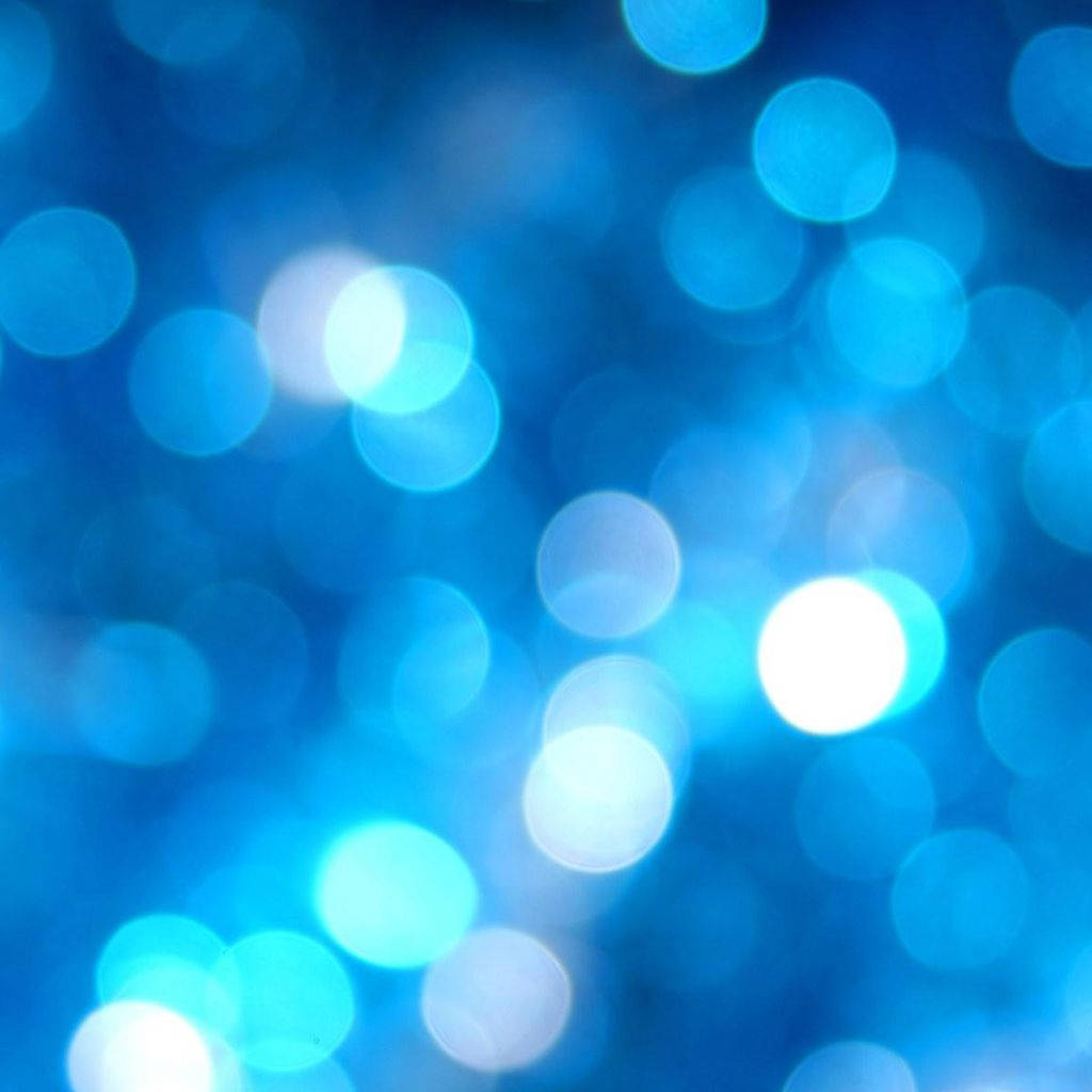 A Beautiful Light Blue Bokeh Effect Wallpaper