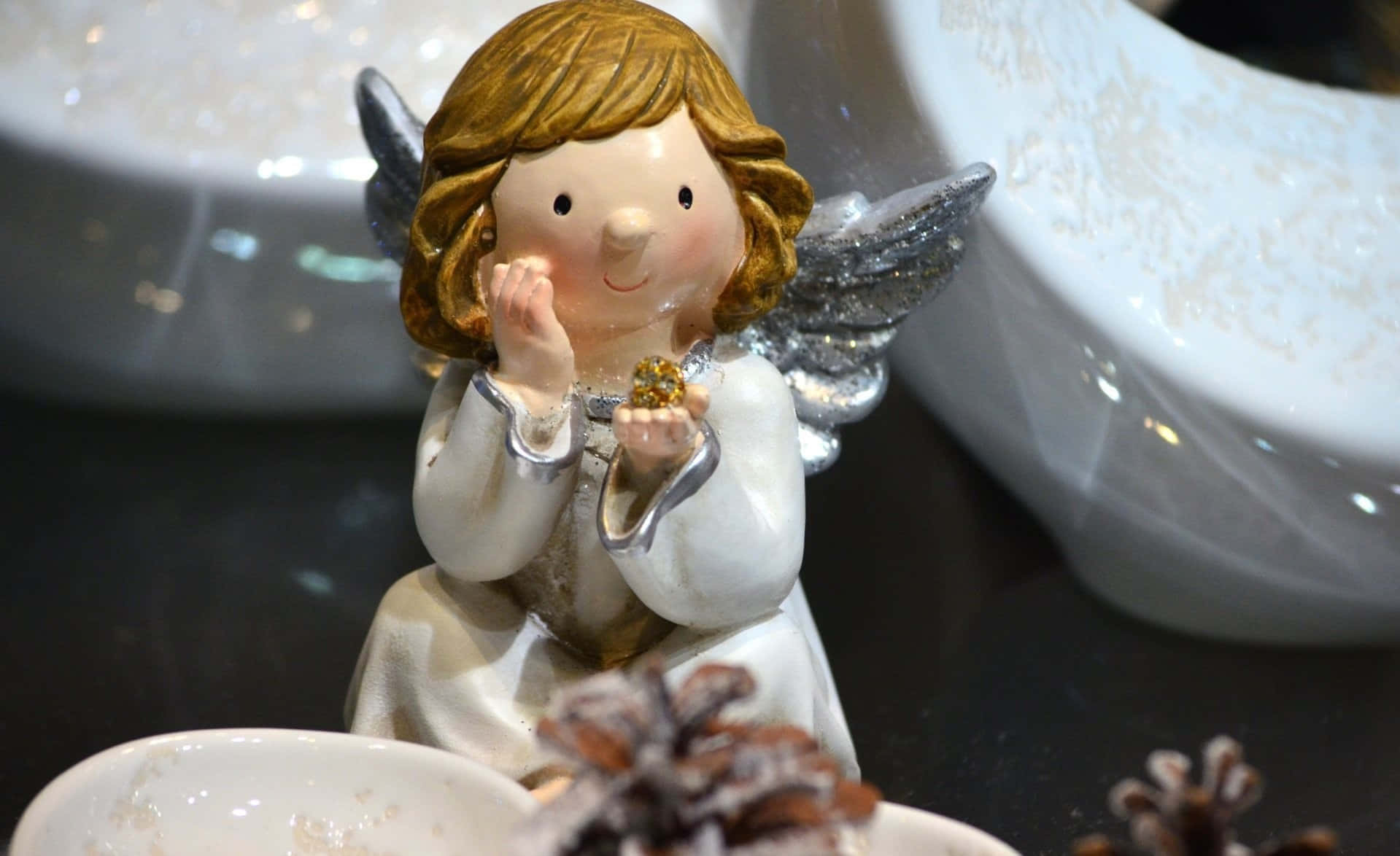 A Beautiful Vintage Angel Bathed In Golden Light Wallpaper