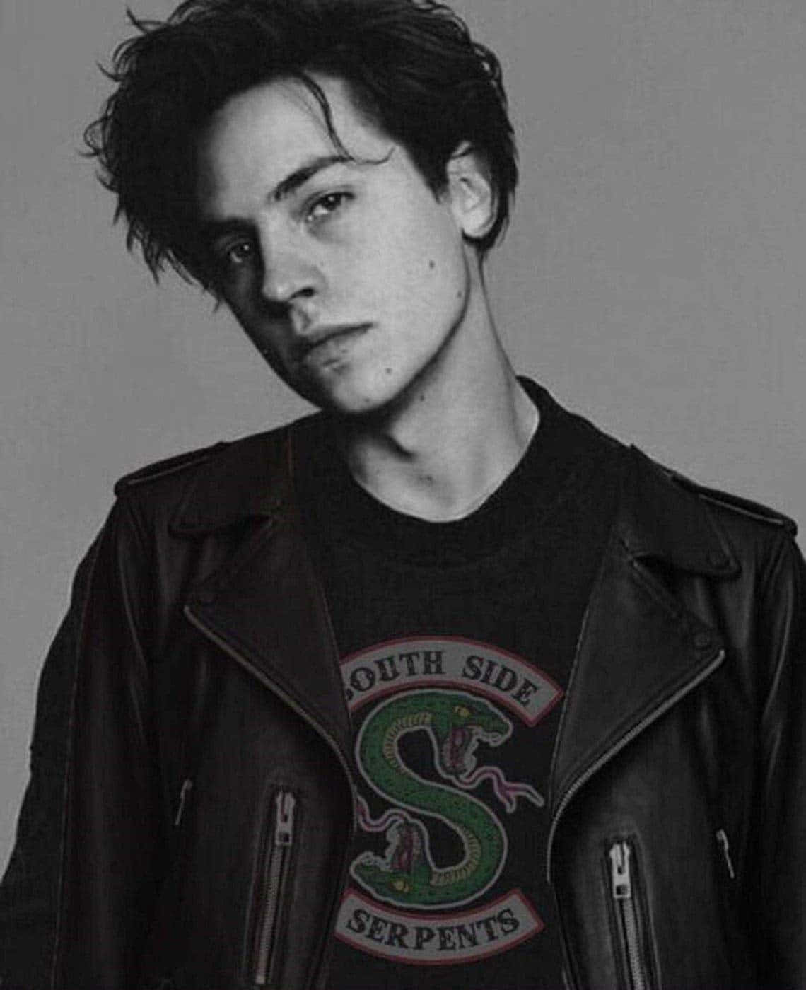 A Black And White Photo Of A Young Man In A Leather Jacket Wallpaper