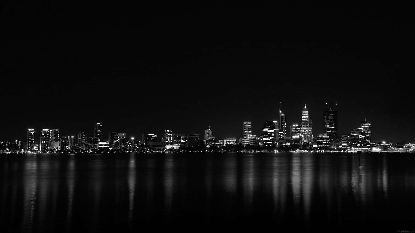 A Black And White Photo Of The City Skyline Wallpaper