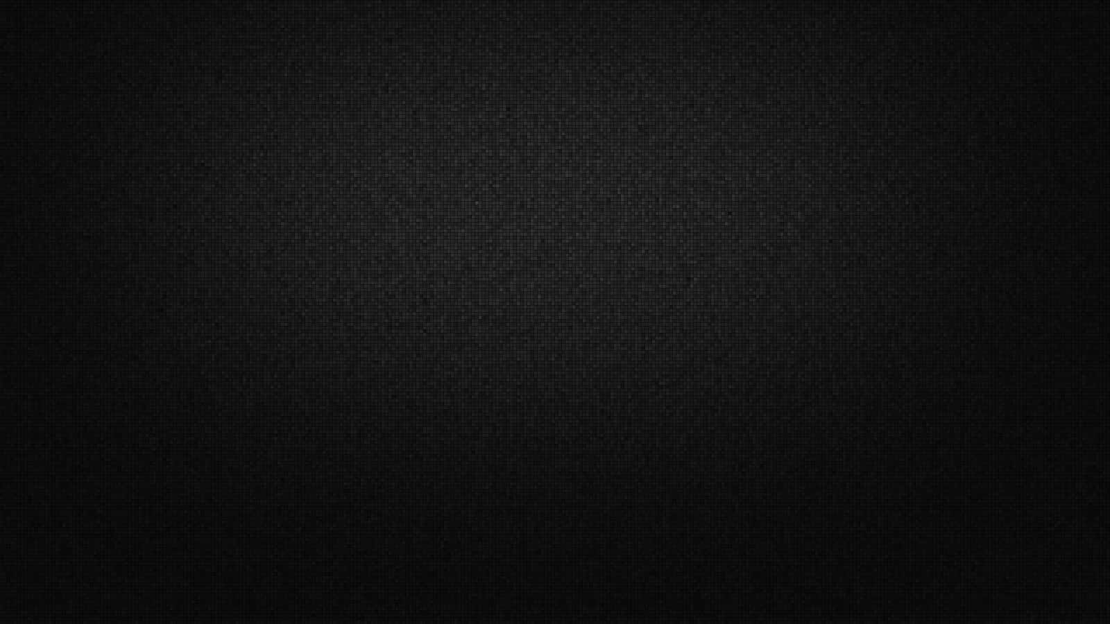 A Black Background With A Light Shining On It Wallpaper