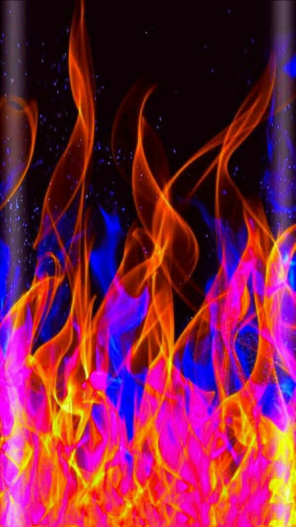 A Blazing Explosion Of Red And Blue Fire Wallpaper