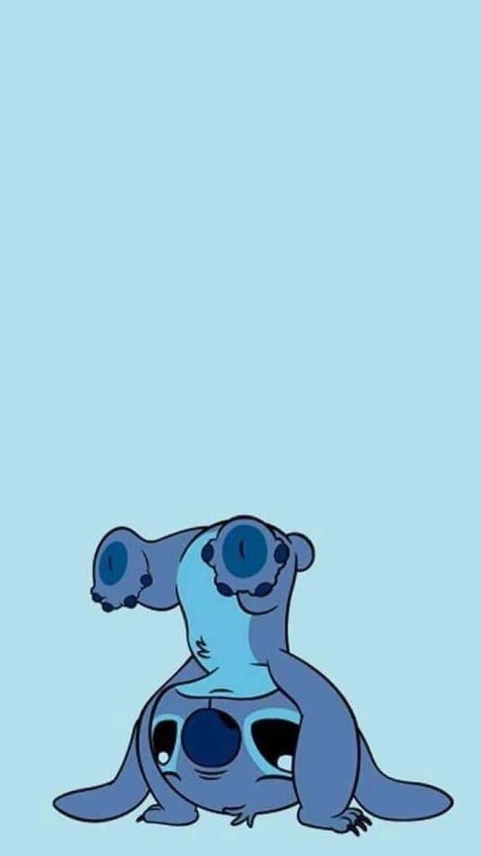 A Blue Cartoon Character With Big Eyes Wallpaper