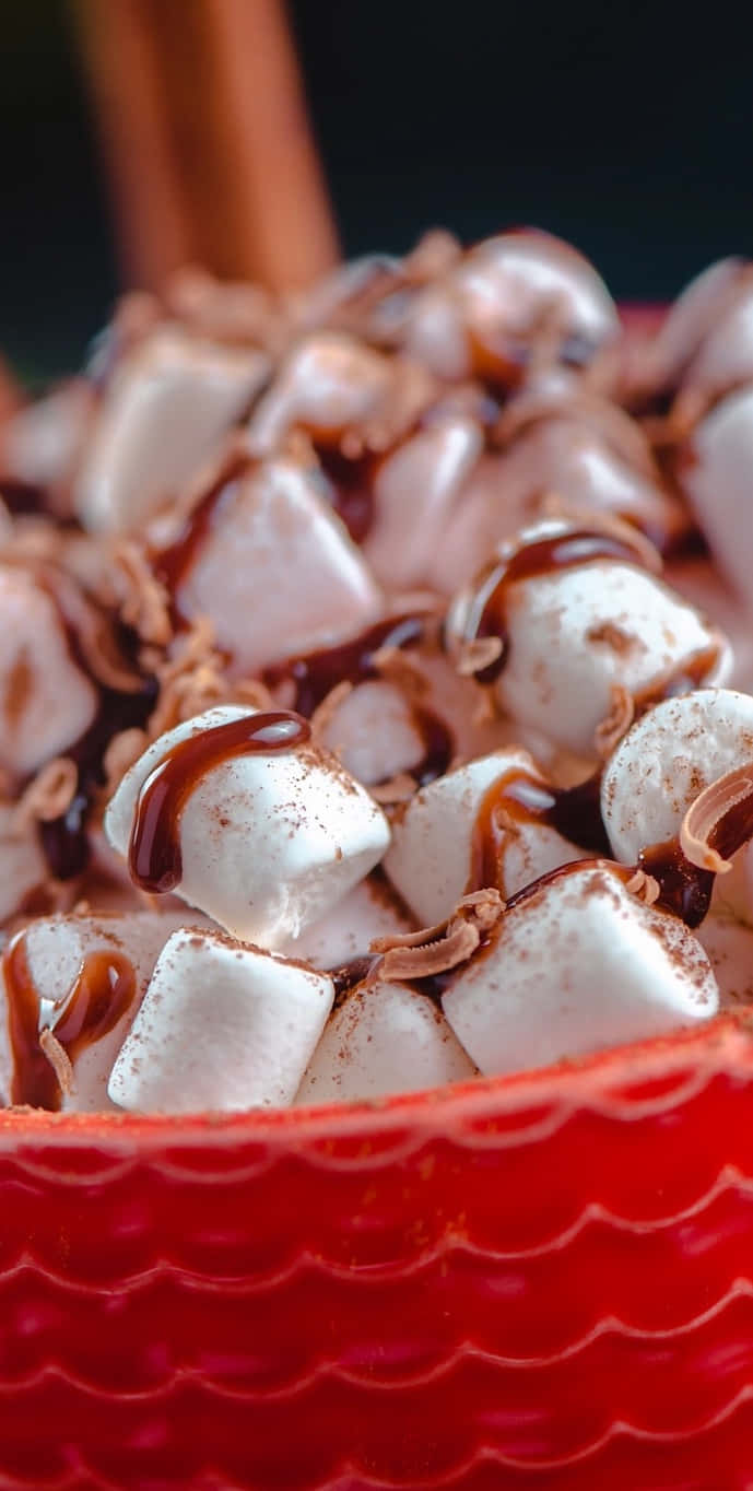 A Bowl Of Marshmallows And Chocolate In A Red Bowl Wallpaper