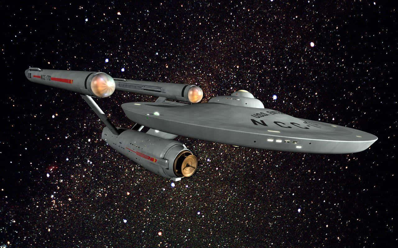 A Brave Adventure Awaits Onboard The Uss Enterprise Wallpaper