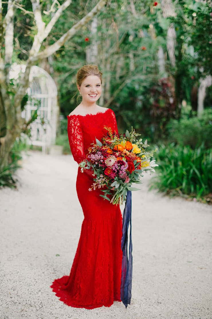 A Breathtaking Red Wedding Scene With Dramatic Lighting Wallpaper