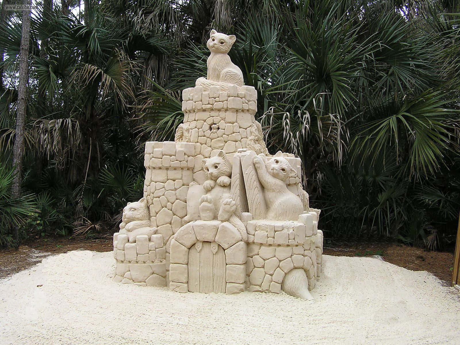 A Breathtaking Sandcastle Masterpiece On A Sunny Beach Day. Wallpaper