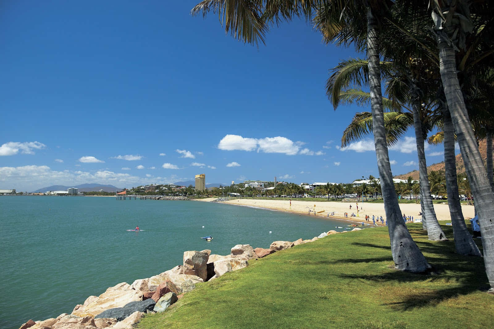 A Breathtaking View Of Townsville Coastline At Sunset. Wallpaper