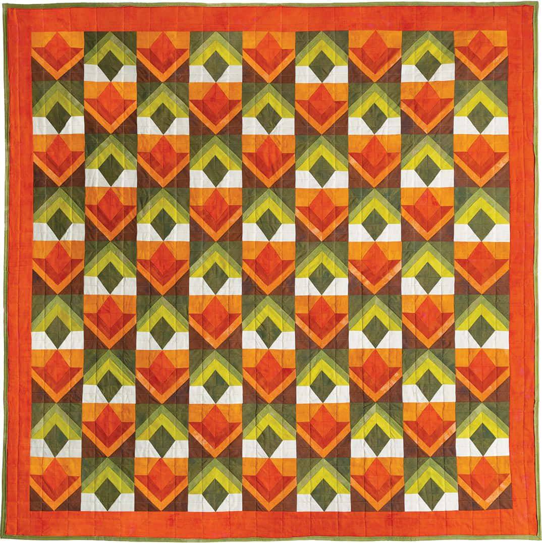 A Bright And Colorful Quilt Made With Patchwork Technique Wallpaper