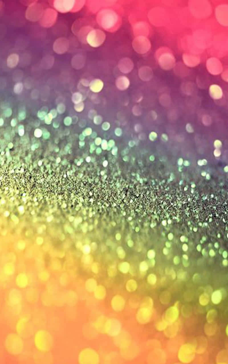 A Bright, Twinkling Rainbow Of Glitter Wallpaper