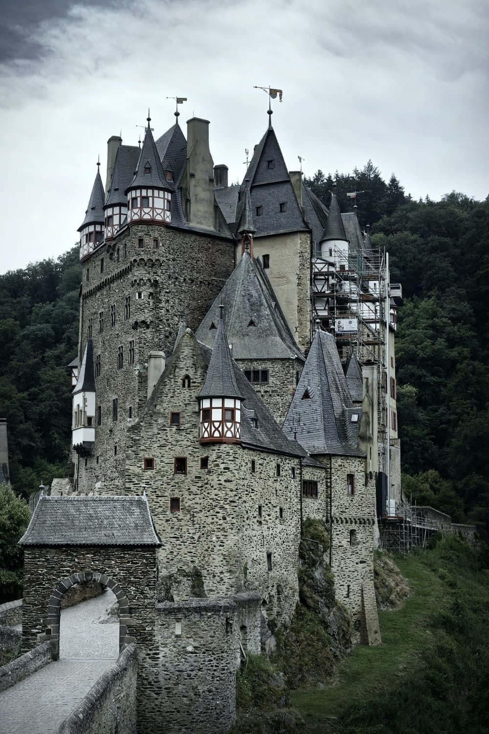 A Castle With A Large Tower On Top Of It Wallpaper