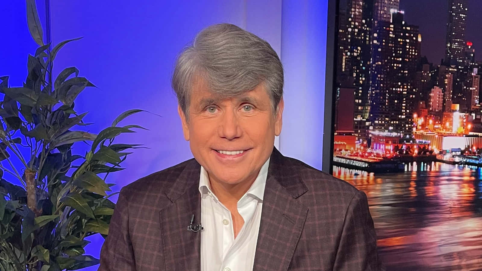 A Charming Portrait Of Rod Blagojevich With An Ear-to-ear Smile. Wallpaper