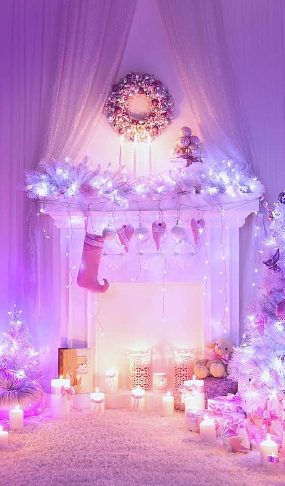 A Christmas Room With Candles And A Fireplace Wallpaper