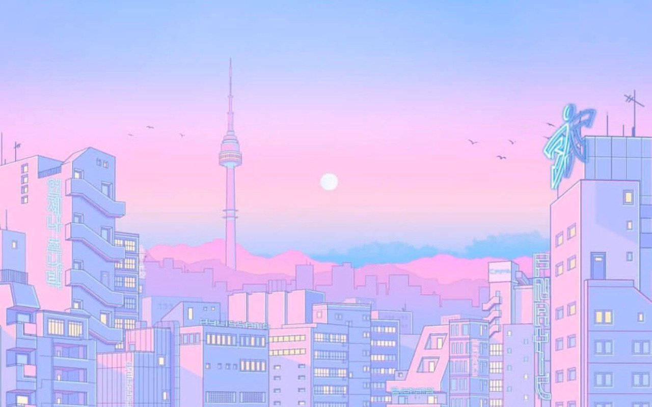 A City With A Pink Sky And Buildings Wallpaper