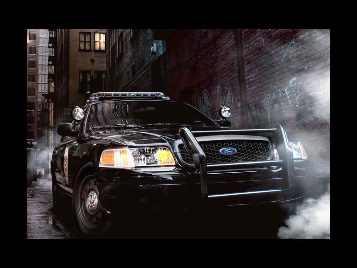 A Classic Ford Crown Victoria Showcasing Its Timeless Design And Smooth Lines Wallpaper