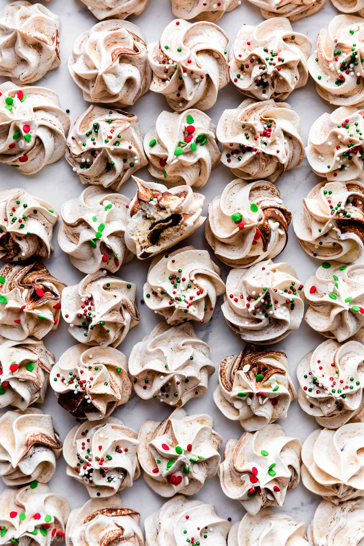 A Classic Tower Of Swiss Meringue On A White Plate Wallpaper