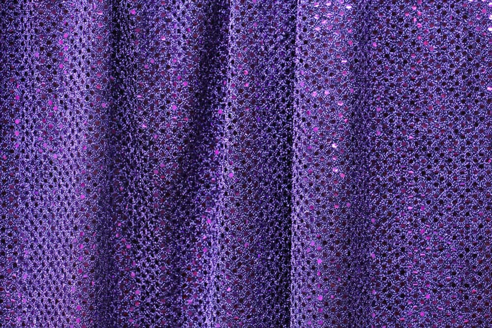 A Close-up Look At Stunning Purple Sequins Wallpaper