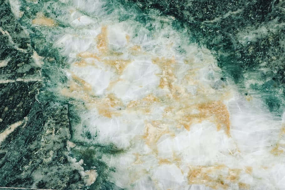 A Close Up Of A Green Marble Wallpaper