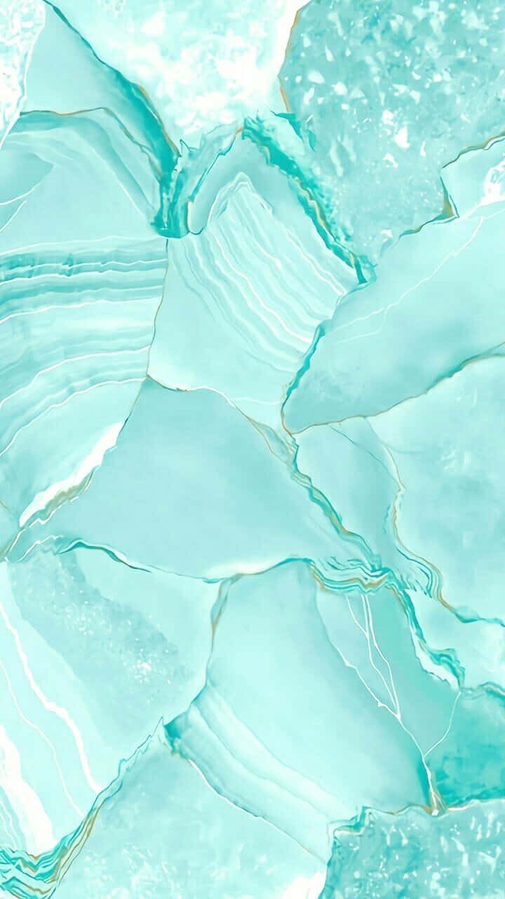 A Close-up Of A White And Mint Green Marble Surface Wallpaper