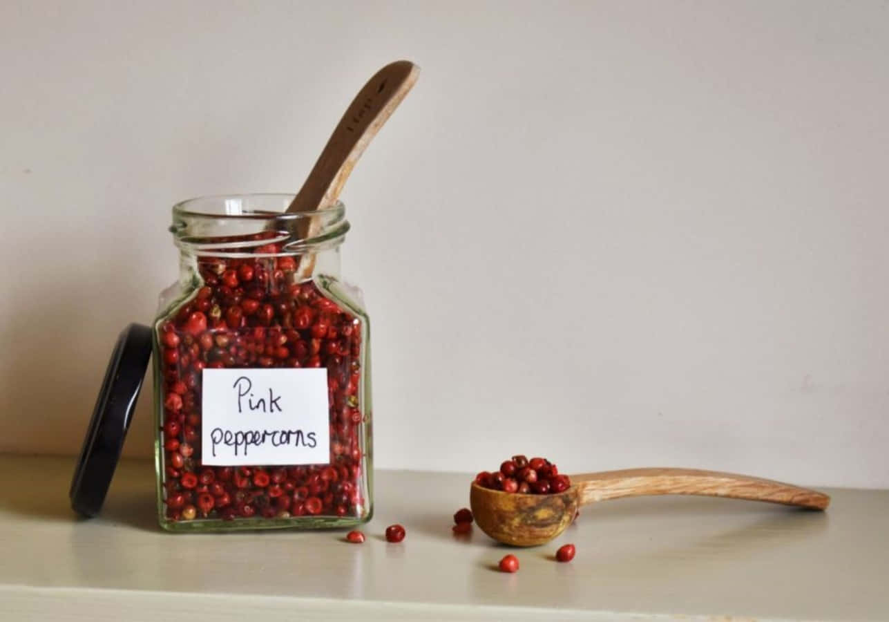 A Close-up Of Pink Peppercorn Wallpaper