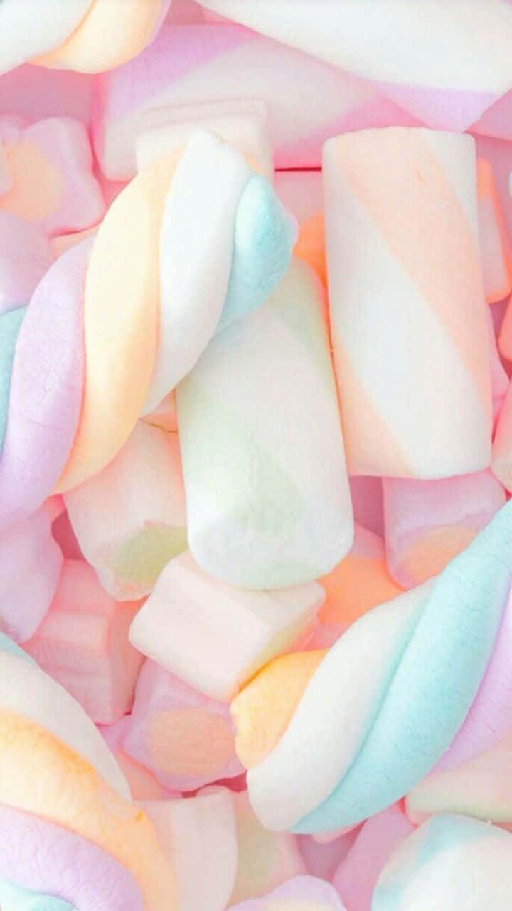 A Close Up Of Some Pastel Colored Marshmallows Wallpaper