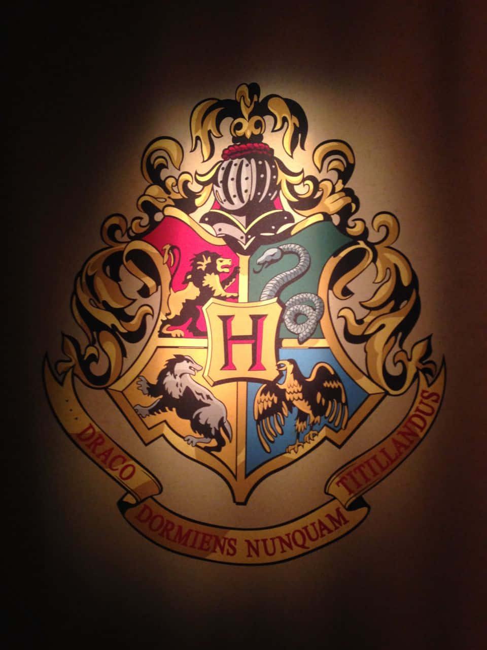 A Colorful Representation Of The Four Hogwarts Houses From The Harry Potter Franchise Wallpaper