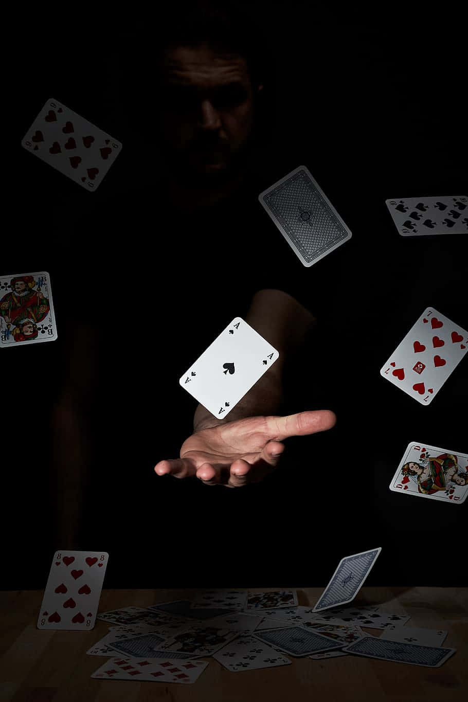 A Competitive Hand In Card Games Wallpaper