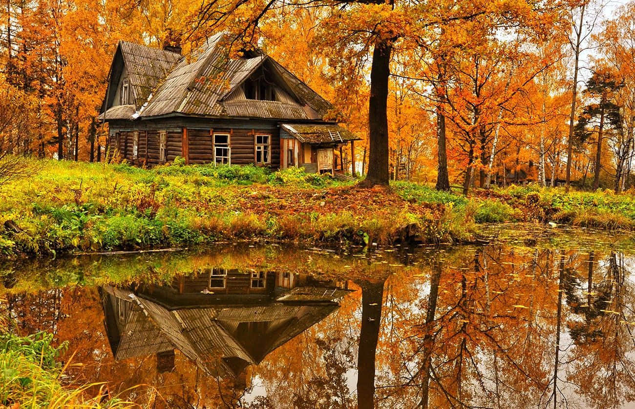 A Cozy Fall Cabin Retreat Wallpaper