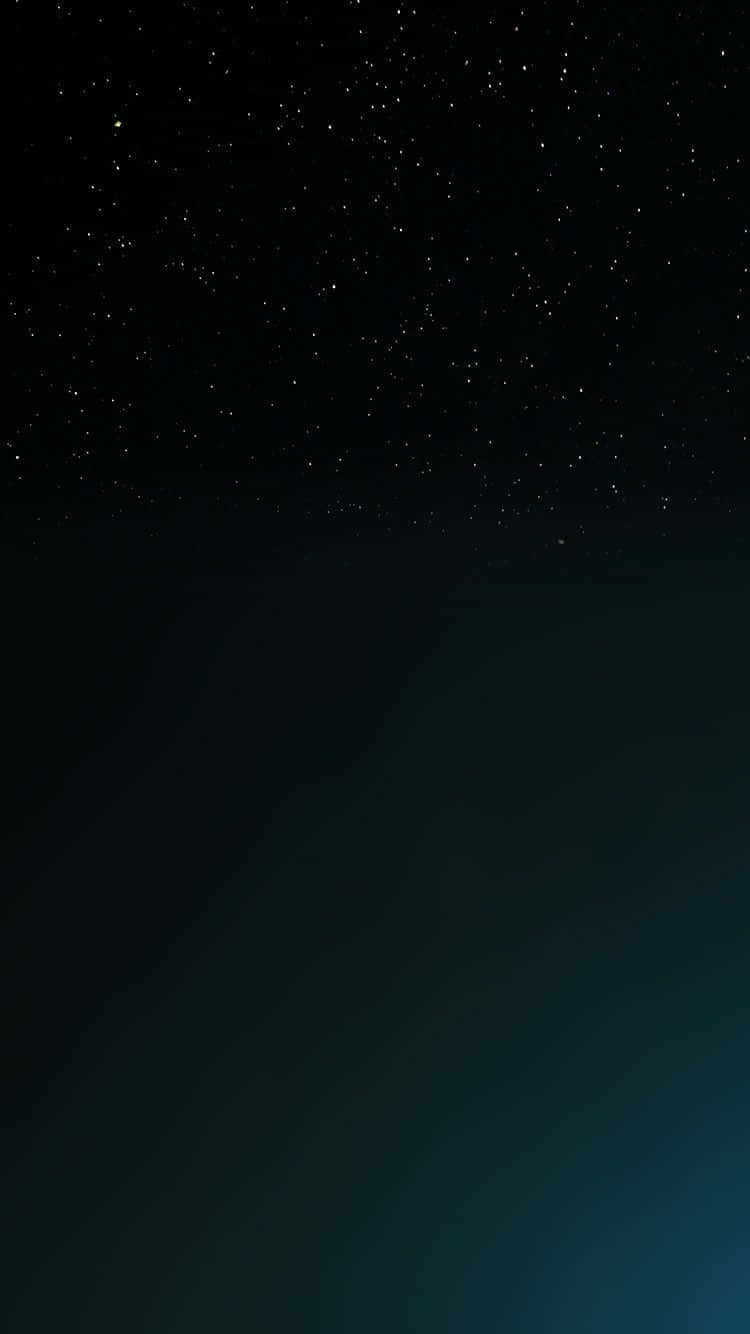 A Dark Blue Star Shining Brightly In The Night Sky Wallpaper