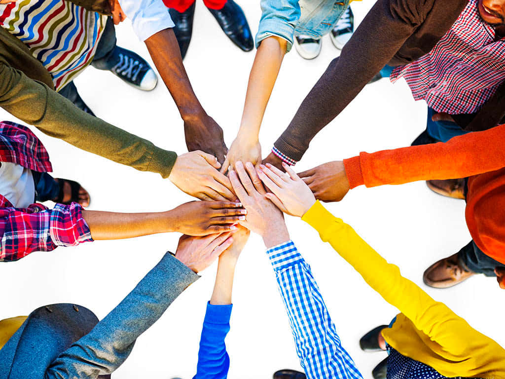 A Diverse Group Of People Forming Unity In Diversity Wallpaper