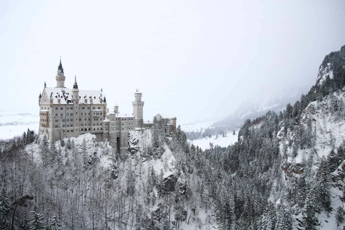 A Dream-like View Of A Castle Amongst The Rolling Hills Wallpaper