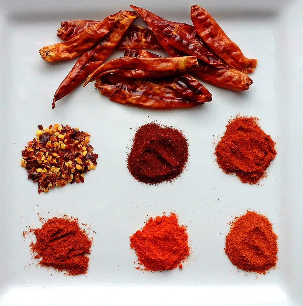 A Fiery Blend Of Spice - Red Chili Powder Wallpaper