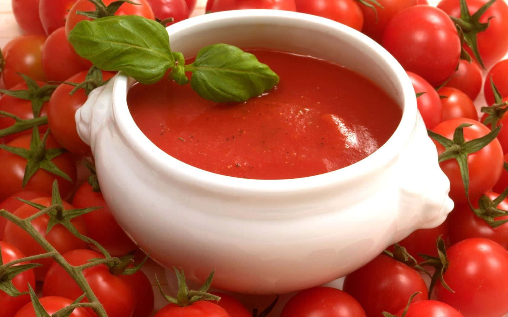 A Flavorful Bowl Of Red Sauce Wallpaper