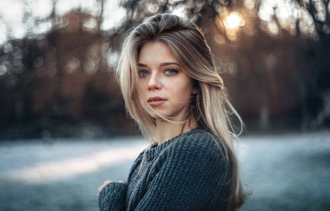 A German Girl Showcasing Her Ombre Hairstyle In A Laid-back Environment Wallpaper