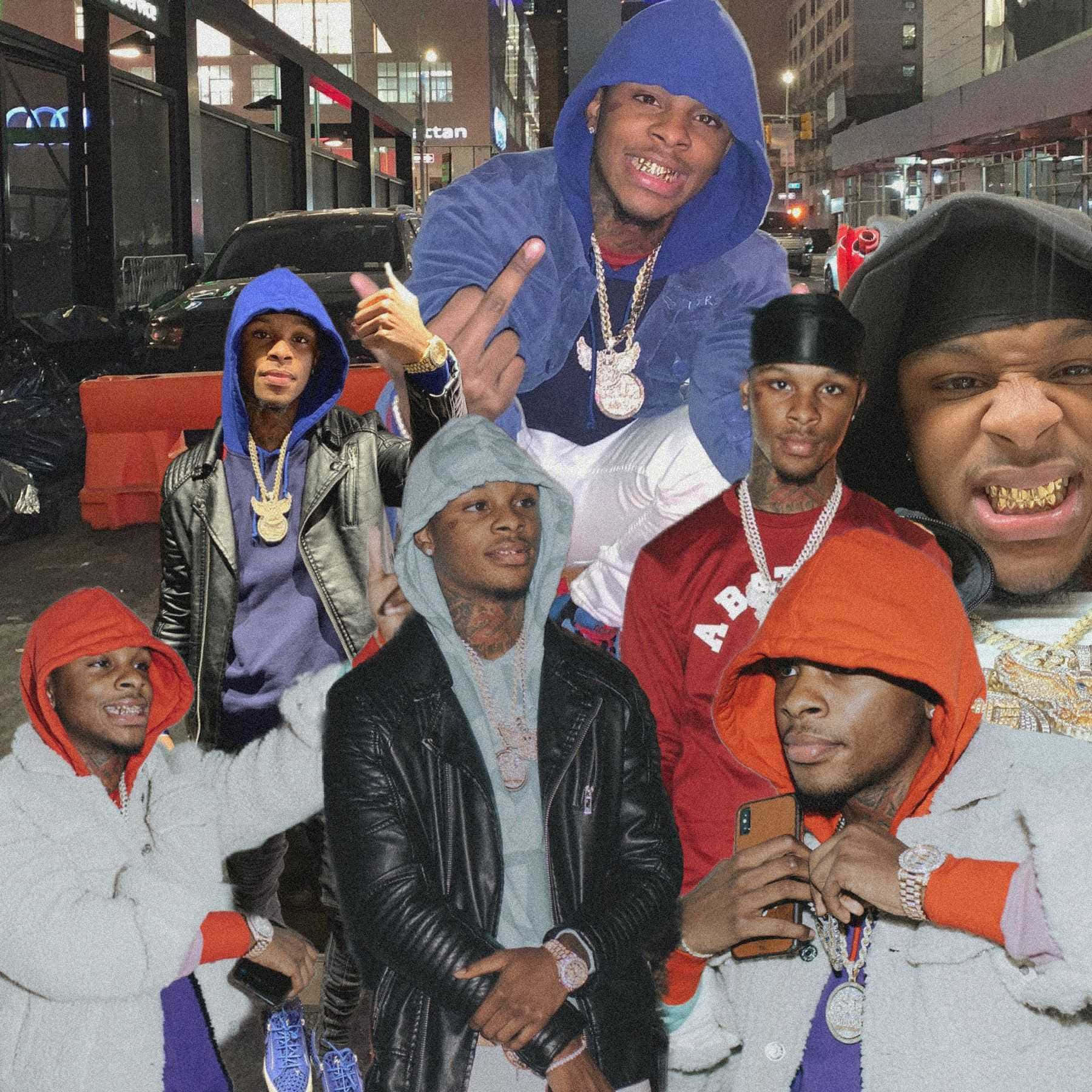 A Group Of Men In Hoodies Wallpaper