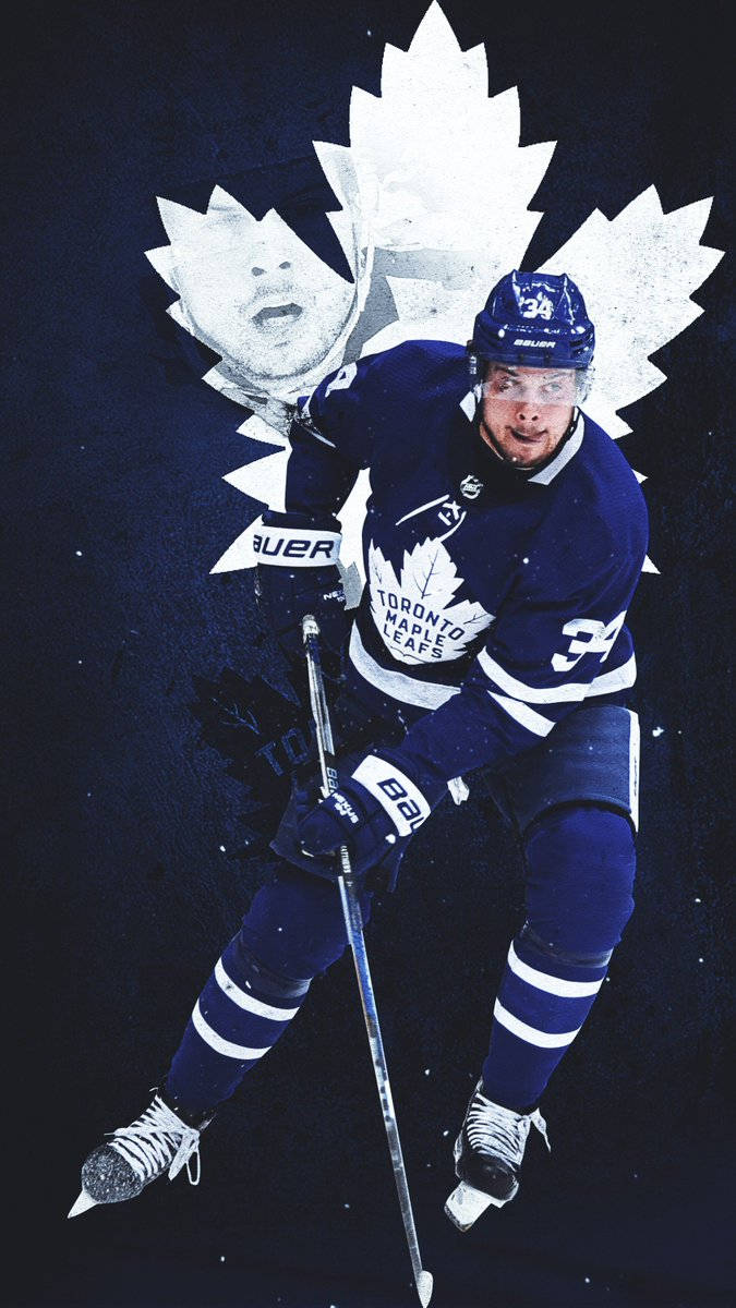 A Hockey Player Is Playing Hockey With A Maple Leaf Wallpaper