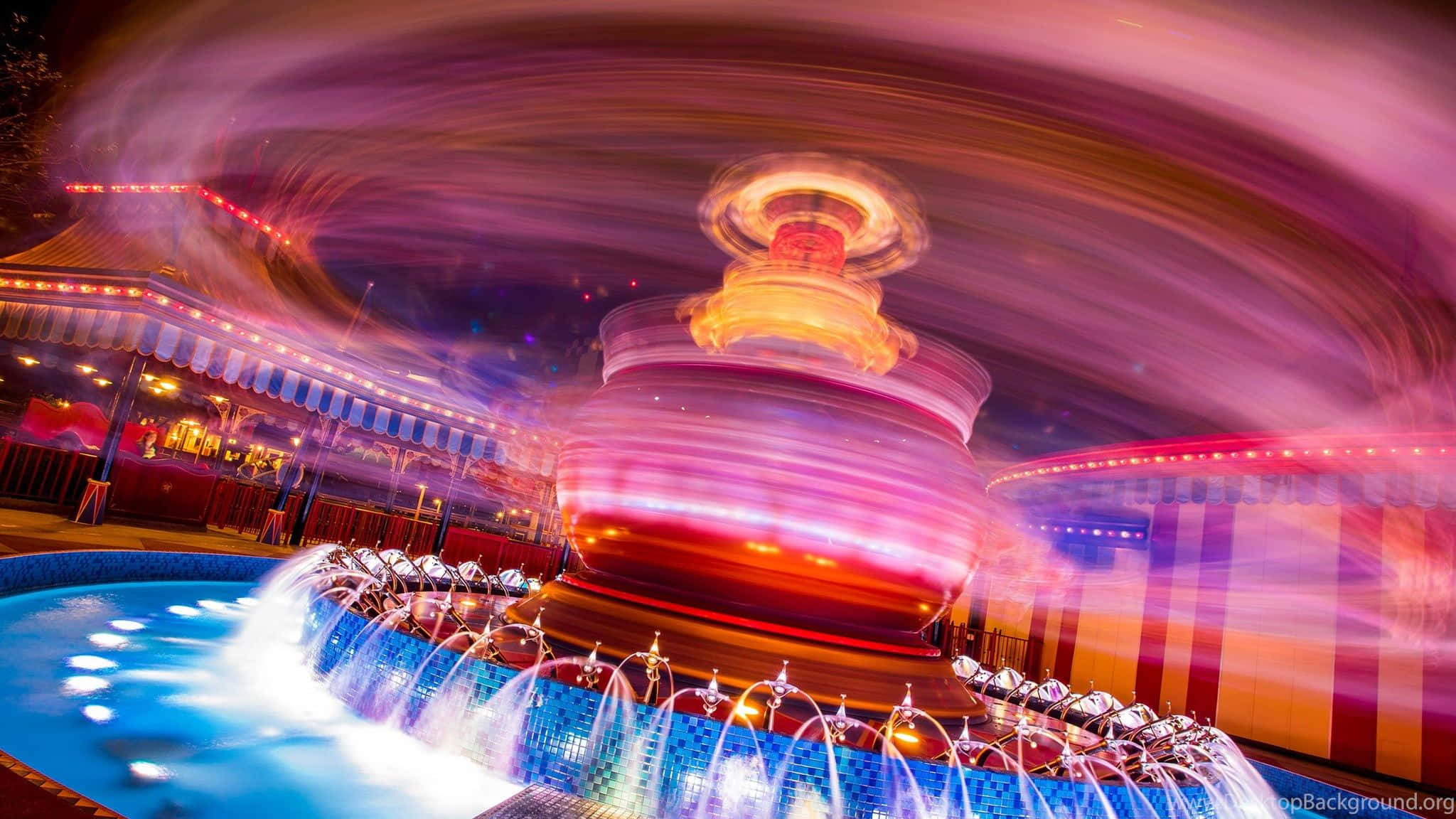 A Long Exposure Image Of A Highway At Night With Motion Blur Wallpaper