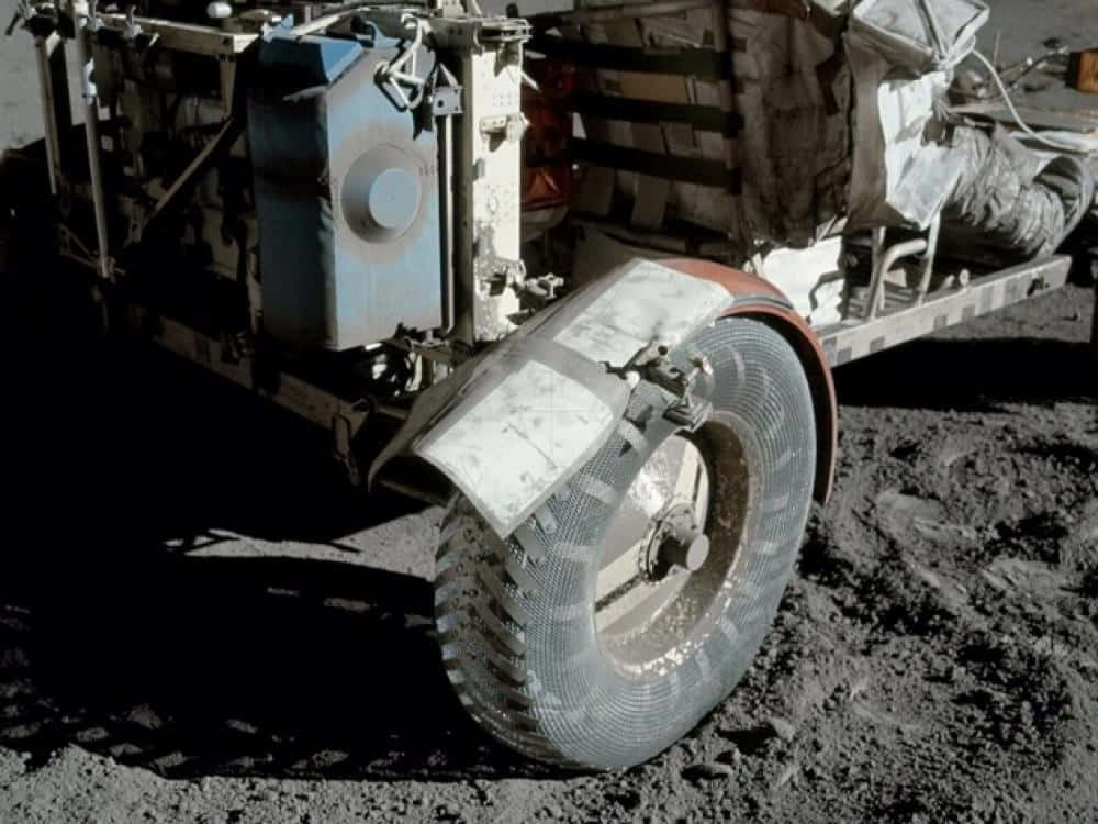 A Lunar Rover Exploring The Surface Of The Moon In A High-resolution Image Wallpaper