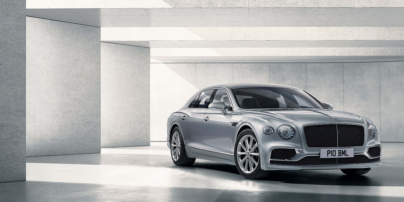 A Luxurious Bentley Flying Spur In Its Full Glory Wallpaper