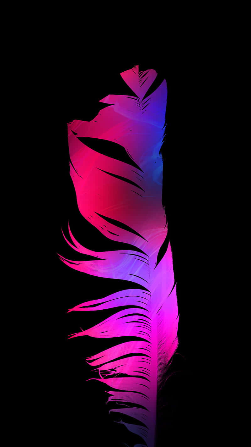 “a Majestic Display Of Color And Light On An Oled Screen” Wallpaper