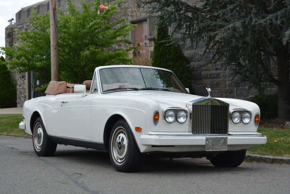 A Majestic Rolls Royce Corniche Displaying Unmatched Luxury Wallpaper