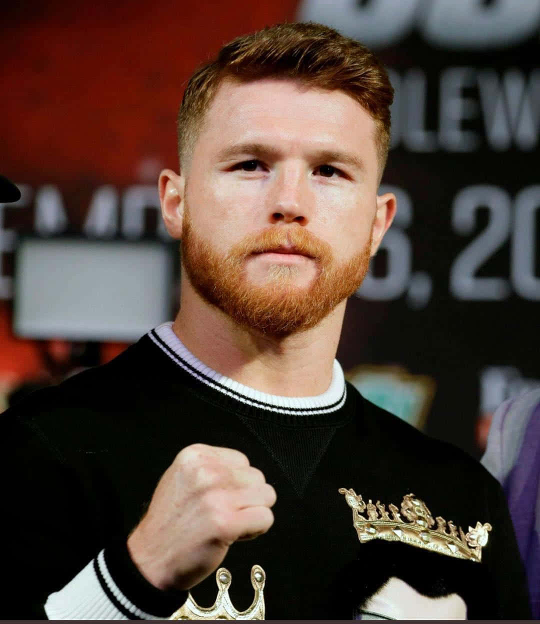 A Man With A Red Beard Is Standing Next To A Boxer Wallpaper