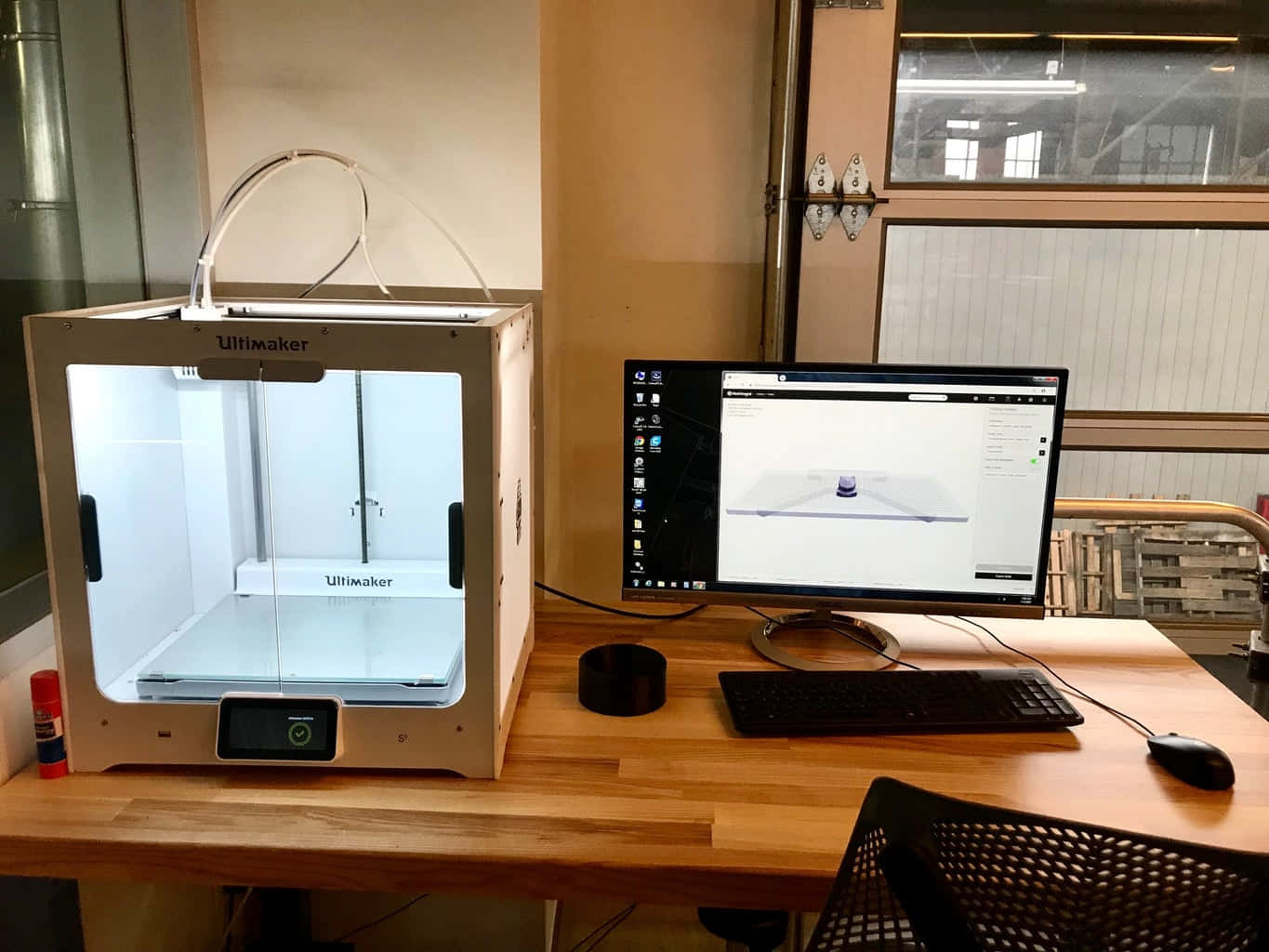 A Modern, High-tech 3d Printer In Action Wallpaper