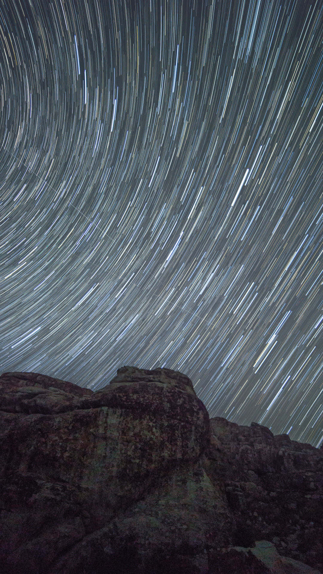 A Picturesque Time Lapse Of Clouds And Stars Wallpaper