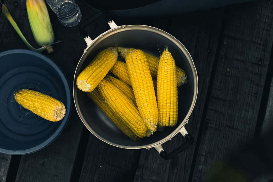 A Pile Of Yellow Corn Kernels Wallpaper