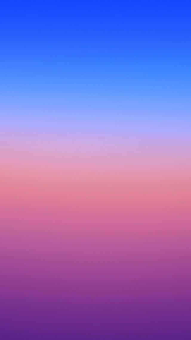 A Pink And Blue Gradient Background Wallpaper